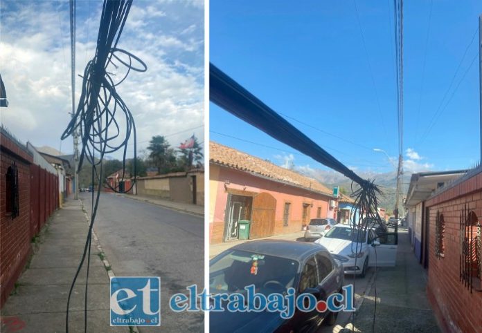 Una verdadera maraña de cables cuelga a baja altura en calle O’Higgins al llegar a Comercio en Putaendo.